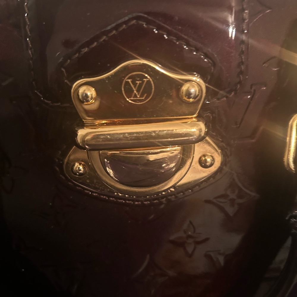 Louis Vuitton Women's Bag - Elegant Brown with Gold Accents
